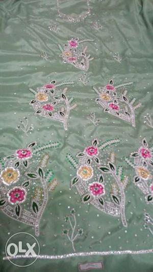Grey And Pink Floral Embroidered Textile