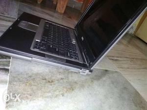 Laptop with charger of dell company