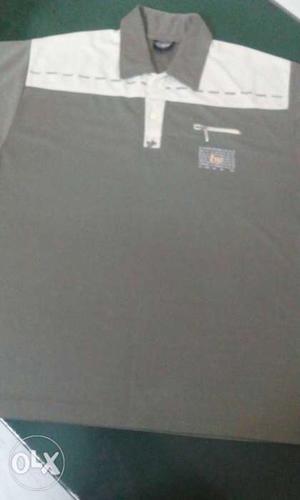 Logus Brand T- Shirt Size - L Gently Used. Price