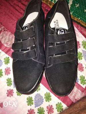 Pair Of Black Velcro-strap Low-top Sneakers