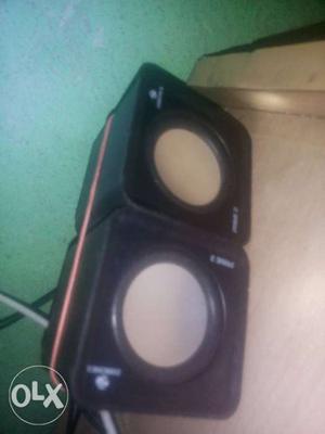 Pair Of Cube-shaped Black Corded Speakers