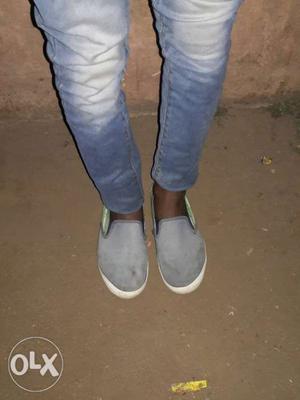 Pair Of Gray Denim Slip-on Sneakers