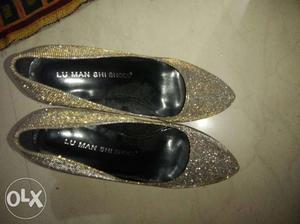 Pair Of Grey Glitter Heeled Shoes