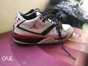 Pair Of White-red-and-black Air Jordan Basketball Shoes