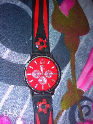 Round Red Chronograph Watch With Black Leather Strap