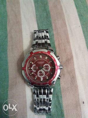 Round Silver And Red Chronograph Watch With Link Bracelet