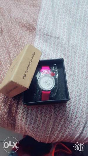 Round Silver-colored Watch With Pink Strap And Box