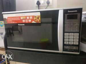 Stainless Steel And Black Panasonic Countertop Microwave