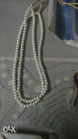 Two White Pearl Necklaces