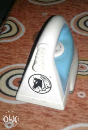 White And Blue Cordless Clothes Iron