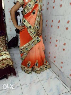 Women's Orange And Gold-colored Floral Sari Traditional