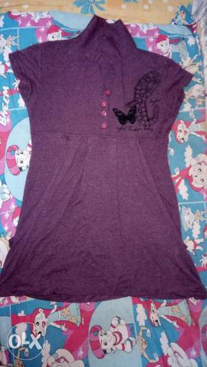 Women's Purple Polo top and white top for 800 only. Genuine