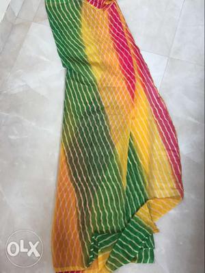 Yellow, Pink, And Green Textile