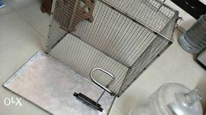 Bird cage...lift to open.. easy to clean.. hand