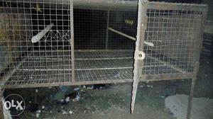 Black And Grey Metal Pet Cage