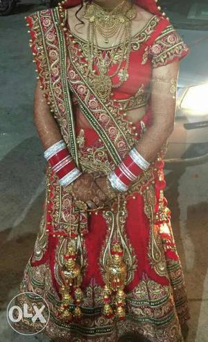 A red colour beautiful wedding lehenga is