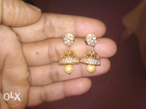 Clear Gemstone Encrusted Gold-colored Jhumka Earrings