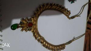 Gold-colored Chandbali Bib Necklace