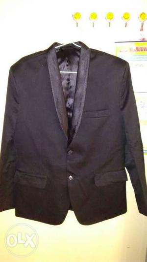 New Black Coat,size 40 Its unused a single time.