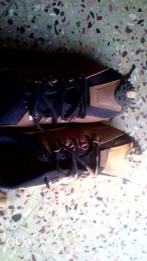 Pair Of Black-and-brown Sneakers