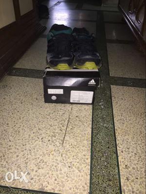 Pair Of Black-and-green Adidas Athletic Shoes With Box