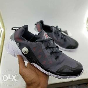 Pair Of Gray-and-black Reebok Running Shoes