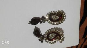 Pair Of Silver-colored Earrings With Clear Gemstones
