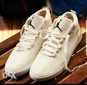Pair Of White Air Jordan Basketball Shoes