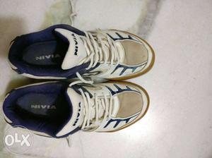 Pair Of White-and-blue Nivia Running Shoes