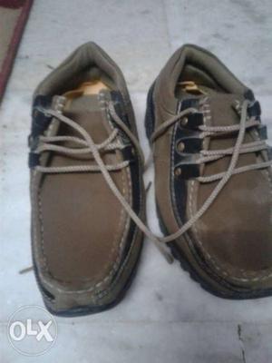 Pair of brown sport shoes in excellent condition