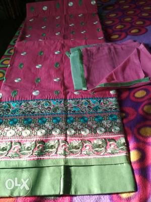 Pink, Blue, And Green Textile