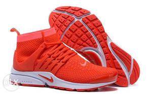 Red-and-white Nike Athletic Shoes