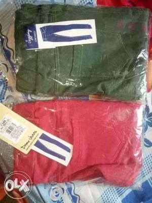 Two Red And Green Jeans Withn Packs