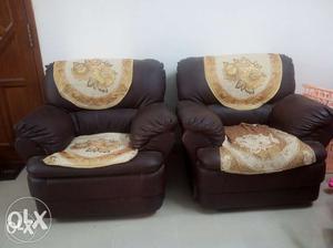 2 single seater Leather sofa 2 years old looks