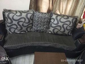 3 seater used sofa, 1 yr old, black grey colour without