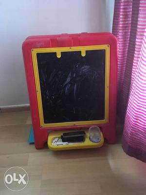 Black nd white board for kids it has legs also