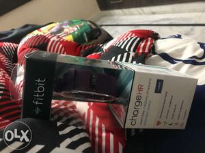 Brand new fitbit Hr for sale in plum colour