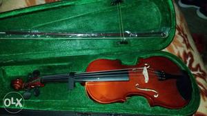 Brown Violin With Bow In Case