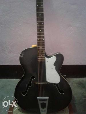 It is brand new spanish guitar 8 months used with