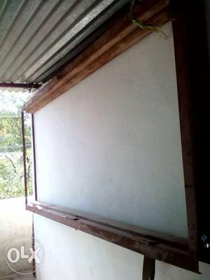 Rectangular Brown Wood-framed Bulletin Board