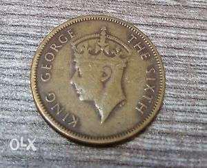 Round Gold-colored British Indian Coin