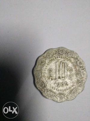 Round Silver-colored 10 India paise Coin