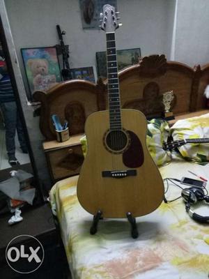 This is kaps jumbo size guitar.it has melodious