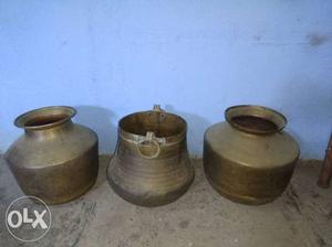 Three Brown Steel Vases