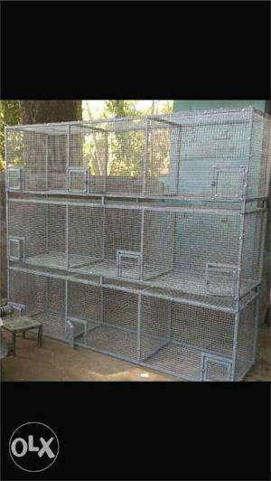 Three Rectangular Gray Steel Pet Crates