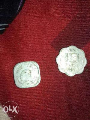 Two 5 And 10 Silver-colored Coins