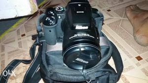 Black Nikon DSLR Camera And Bag Set