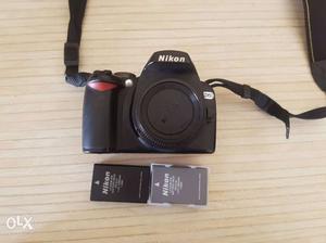 Nikon D60 DSLR with charger, lens and one