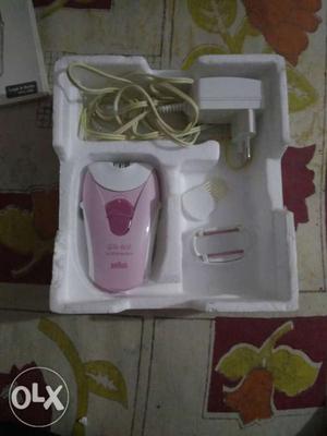 Pink And White Braun Cordless Epilator With Charger