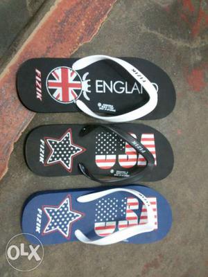 Two Black And One Blue Flip-flops